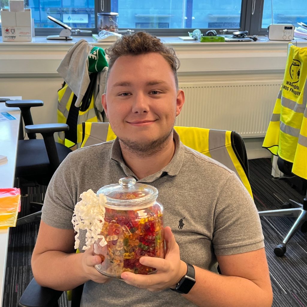 ACS Team Member Thomas winning the Jar of Sweets